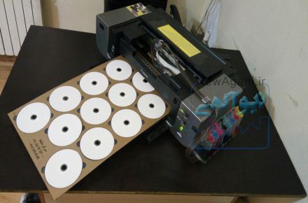 دستگاه چاپ همزمان 12 CD/DVD کانن